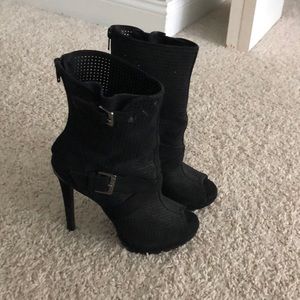 Black high heel with toe out front